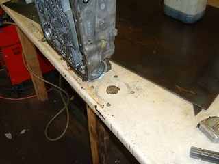 Not a special tool, but very handy for rebuilds is a hole in your bench